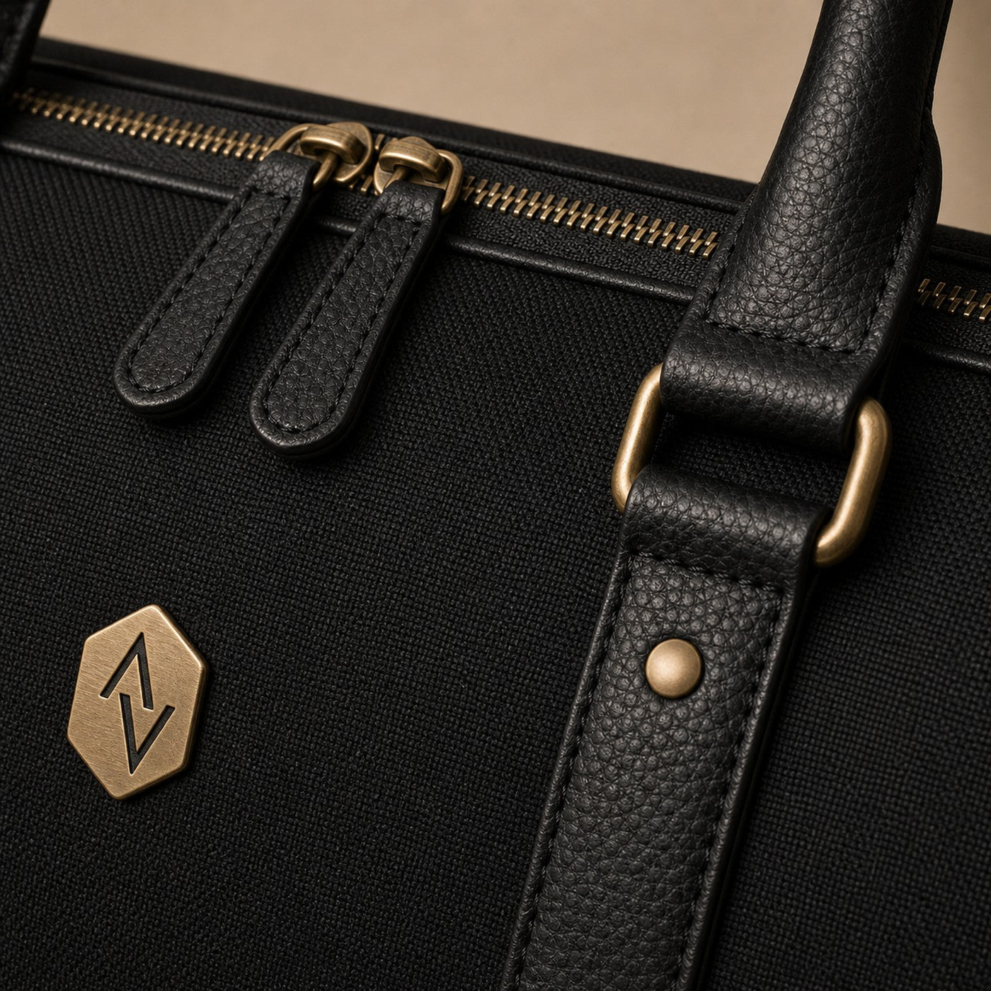 The Weekender material, zipper, hardware, and stitching close-up.