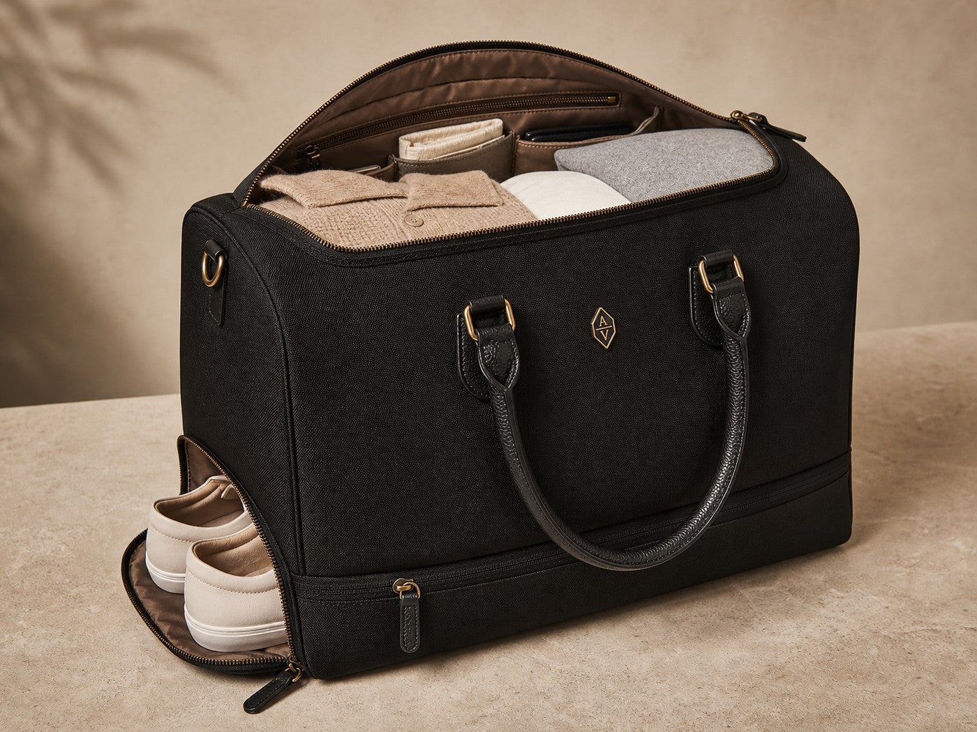Large Weekender product card image with bag open and packing visible.